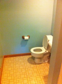 Old toilet Old toilet and toilet paper holder